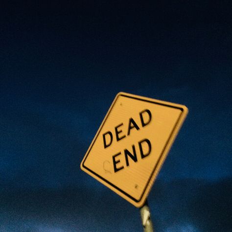 Photo of a Dead End sign at night. Yellow sign with black wording. Dark blue sky background. Digging A Grave Aesthetic, Defense Against The Dark Arts Aes, Ominous Signs, Dead End Sign, Don’t Open Dead Inside, Dead Forest, Dead Of Night, Gay Sticker, Sign Photography