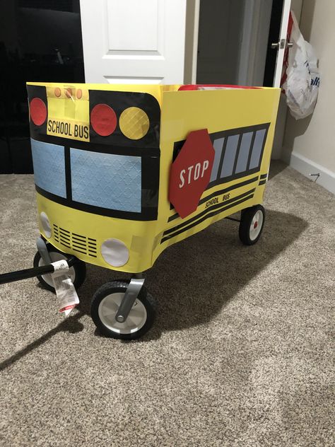 Turn your wagon into a fun school bus for your toddler. School Bus Wagon Costume, Bus Halloween Costumes, Struggle Bus Costume, Sesame Street Wagon Halloween, Wagon Costume, Energy Bus, Kids Wagon, Struggle Bus, Fun School