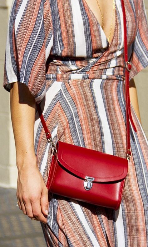 A cross-body is simply a must-have for every woman. The portable size easily transitions from day to night, and they can also be slung over an array of outfits. We LOVE this simple red leather cross body. Red Crossbody Bag, Red Leather Bag, Best Crossbody Bags, Red Crossbody, Trending Fashion Outfits, Women Bags Fashion, Essential Bag, Work Bags, Red Cross