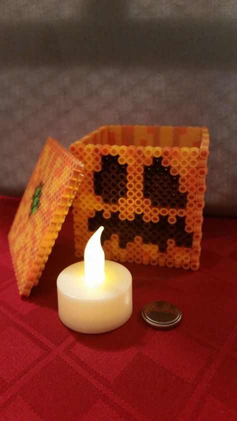 Minecraft perler bead pumpkin Minecraft Pumpkin, Perler Bead Designs, Pearl Beads Pattern, Easy Perler Beads Ideas, 3d Perler Bead, Art Perle, Perler Bead Templates, Perler Crafts, Diy Perler Bead Crafts