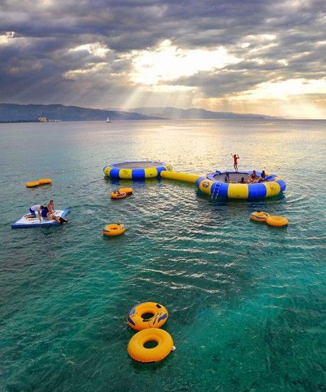 No matter how epic your weekend was, it will probably pale in comparison to this scene. Just take it in for a minute. It's a double aqua trampoline in the middle of a lake. Right? Until now we never imagined it was something we so desperately needed. Admittedly, a floating bounce house is no new Jamaica Water, Bucket List For Girls, Bucket List Quotes, Water Trampoline, Old Hospital, Water Tube, Beach Water, Summer Water, Trampolines