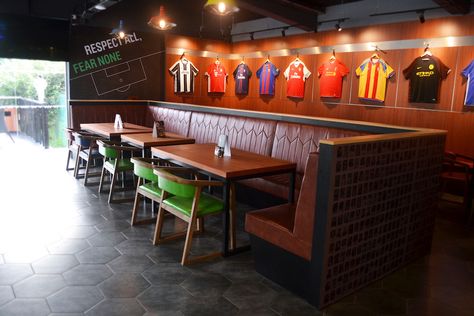 Given the name of this resto-bar – and the fact that it’s part-owned by football legends Ryan Giggs and Gary Neville – it would be a bit odd if they weren’t sho Football Pub, Resturant Decor, American Sports Bar, Sport Bar Design, Sports Bar Decor, Bar Lounge Room, Gary Neville, Pub Interior, Ryan Giggs