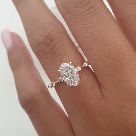 ✥ Introducing our exquisite 1.50ct Elongated Oval Cut Moissanite Petite Pave Engagement Ring, a true masterpiece of refined beauty. The elongated oval cut moissanite centerpiece, weighing 1.50ct, exudes a timeless allure and mesmerizing sparkle. Adorned with a delicate pave band, meticulously set with tiny shimmering s Pretty Engagement Rings, Elongated Oval, Cute Engagement Rings, Moissanite Bridal Sets, Future Engagement Rings, Oval Engagement, Dream Engagement Rings, Beautiful Engagement Rings, Engagement Rings Oval