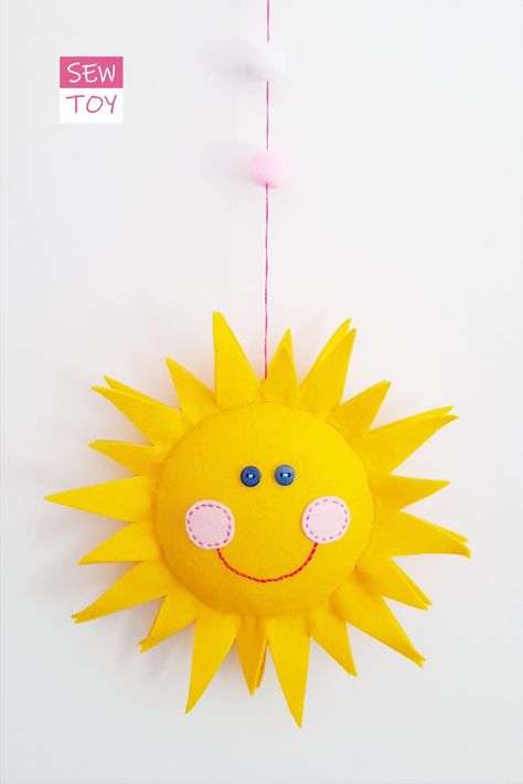 Felt sun DIY, pattern with the step-by-step tutorial, is an EASY sewing project for sewing and embroidery BEGINNERS. 
.
Sun's bright colors, smiley face, and meaningful quote at the back will be cute addition to any baby nursery and kids room and it is really easy and fun to make. It can also be a cute baby shower gift, baby girl, or baby boy gift.
.
As it is looking at me while I work, it makes me feel warm it makes me feel good, life is good! You just have to smile back to him. :))) Sun Embroidery Simple, Simple Felt Sewing For Kids, Diy Sun For Classroom, Sun Felt Pattern, Sun Diy, Felt Sun, Diy Crafts Butterfly, Embroidery Beginners, Sun Pillow