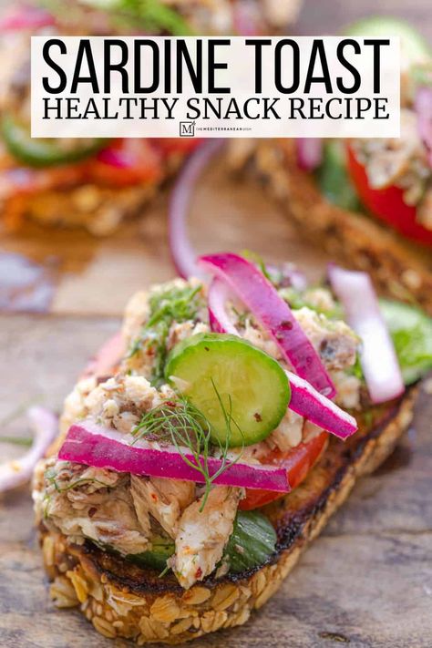 Sardine toast with pickled red onions, dill, chermoula, cucumber and tomato. An easy and affordable healthy snack recipe! Sardine Recipes Canned, Sardine Toast, Osteoporosis Diet, Healthy Snack Recipe, Cucumber And Tomato, Sardine Recipes, The Mediterranean Dish, Mind Diet, Pickled Red Onions