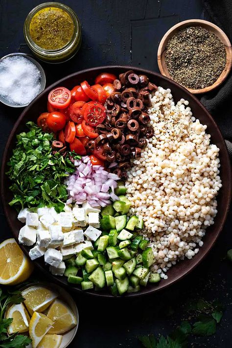 Israeli couscous salad Greek Salad Couscous, Salad Recipes Couscous, Pearl Cuscus Salad, Kale And Couscous Salad, Pearl Couscous Salad Recipes, Vegetarian Couscous Recipes, Pearl Couscous Recipes Dinner, Couscous Ideas, Couscous Recipes Pearl