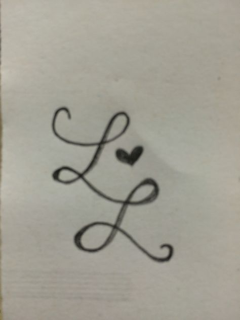 A tattoo doodle I came up with! Two cursive L's linked together with a heart. My wife and I both have names that start with "L" so I'd like to get this on either my left shoulder or below my left breast. Double L Tattoo, Letter L Tattoo Ideas, Cursive L Tattoo, L Tattoo Letter, Letter L Tattoo, Signature Inspiration, Cursive L, Best Tattoo Fonts, Cursive Tattoos