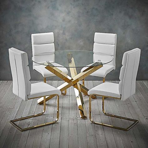 Add some dazzle to your dining area with our old school glamour Amalfi table. Gleaming gold finish legs with a clear glass round table top, perfectly partnered with the faux leather Antibes dining chair that has a matching gold leg. The chairs are available in 2 colours to match most interiors. Giving your living or dining area a truly luxurious feel, the new Antibes Dining Chairs will leave your home feeling more opulent and at a sensible price. Sleek white faux leather encompasses the triple c White Leather Chair, Glass Round Dining Table, Gold Dining, Faux Leather Chair, Dinning Set, Glass Top Dining Table, Ochre Yellow, Faux Leather Dining Chairs, Fajardo