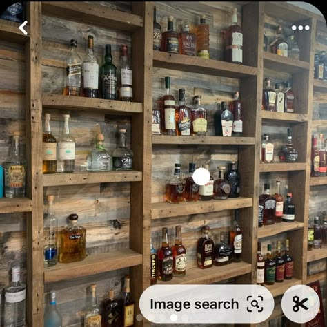 Small Bar Display, Floating Shelves For Liquor Bottles, Shelving For Liquor Bottles, Small Rustic Bar Ideas, Wine Cellar Shelving, Liquor Bottle Shelf Display Diy, Man Cave Shelves, Man Cave Display Shelves, Wall Bar Shelves