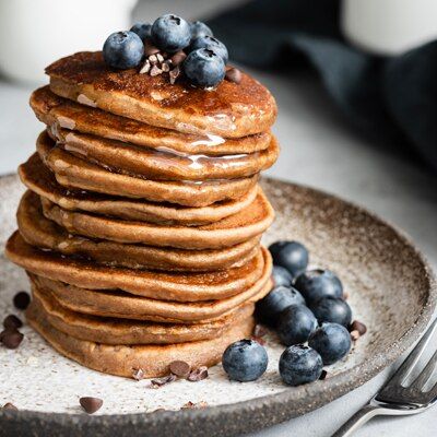 Whole-Wheat Pumpkin Blueberry Pancakes Pumpkin Blueberry, Protein Pancakes Recipe, Pumpkin Breakfast Recipes, Blueberry Pancakes Recipe, Pumpkin Breakfast, Whole Wheat Pancakes, Magnesium Rich Foods, Wheat Pancakes, Buckwheat Pancakes