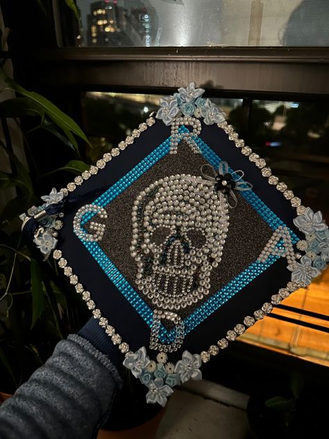 Rhinestone Skull / Skeleton graduation cap with blue flower decor Skeleton Graduation, Blue Flower Decor, Blue Flowers Decor, Rhinestone Skull, Grad Cap, Flower Decor, Graduation Cap, Blue Flower, Flower Decorations