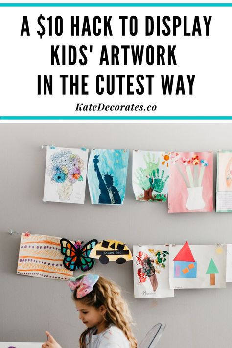 If you're wondering how to display kids wall art at home on the cheap, this quick, $10 wall art display hack is THE most genius solution. Never worry about how to display kids art again ... and your kids will be so thrilled to see all their gorgeous artwork displayed proudly in your home! #kidsdecor #kidsart #kidscrafts #kidsroom #kidsroomdecor #kidsartprojects #homedecor #easydiy Kids Art Display Cable, Kid Art Work Display, Hanging Kids Artwork On The Wall, Kid Wall Storage, Toddler Art Display Ideas, Diy Art Display Kids, How To Hang Kids Art On Wall, Kids Art Display Wall Hanging Artwork, Drawing Display Ideas