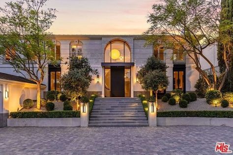 Nicole Richie and Joel Madden Reportedly Buy Beverly Hills Mansion for $10.2M - MarketWatch Joel Madden, Beverly Hills Mansion, Marble Island, Beverly Hills Houses, Stone Backsplash, Thanks For The Support, Vogue Living, Curved Staircase, Deco Boheme