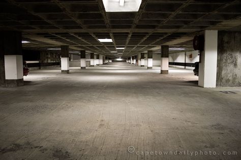 A parking garage Haunted Garage, Musician Photography, Underground Garage, Episode Interactive Backgrounds, Episode Backgrounds, Valentine Photography, Parking Design, Garage Floor, Parking Garage