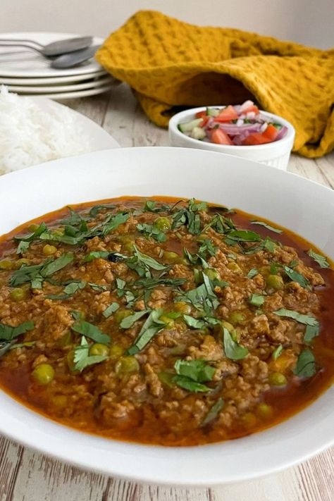 If you’re looking for a quick and easy weeknight Pakistani curry recipe, you’ll love this keema matar recipe. This Keema Matar recipe is a simple Pakistani curry made with ground beef and fresh or frozen green peas simmered in a flavorful sauce! Serve this easy keema matar curry with steamed rice or roti or bread for an easy weeknight meal! Beef Keema, Easy Dinners For Two, Desi Food, Steamed Rice, Green Peas, Curry Recipe, Ground Meat, Easy Weeknight Dinners, Easy Weeknight Meals