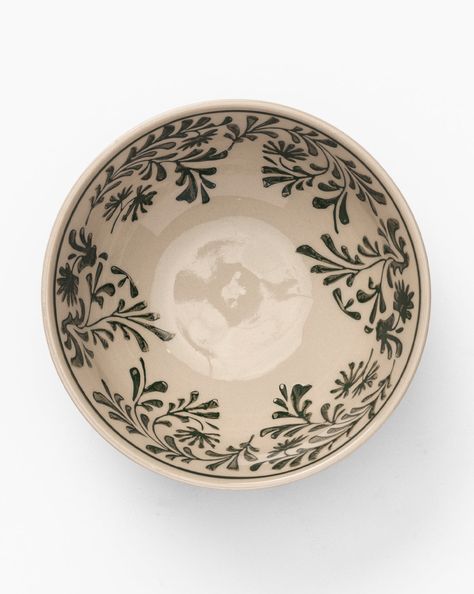 Expressive and romantic, the Mattia Hand Painted Bowl is beautifully detailed with traditional floral patterns. Made of glazed stoneware with hand painted motifs, the bowl brings timelessness and practicality to your table settings. | McGee & Co. | Mattia Hand Painted Bowl Green/Floral Serving Plates And Bowls, Designer Liner Pottery, Watercolor Glazing Ceramics, Bowls And Plates Set, Mediterranean Dishware, Hand Painted Platter, Hand Painted Ceramic Bowls, Hand Painted Pottery Bowls, Pottery Plate Designs