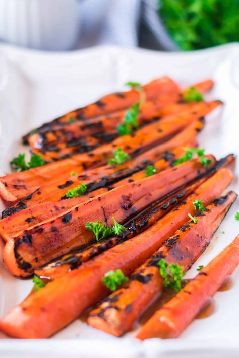 Try my glazed carrot recipe that you can roast in the oven or toss on the grill. This glazed carrot recipe is so easy to make and sweet and savory. #carrots #roasted #grilled #easy #sidedish #holiday #weeknightmeal #recipe #sweetcarrots #honey #brownsugar Glazed Carrot, Carrot Recipe, Roast In The Oven, Glazed Carrots Recipe, Candied Carrots, Grilled Carrots, Roasted Carrots Recipe, Grilled Roast, Carrots Recipe