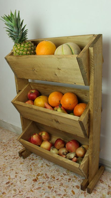 A rustic, market-style stand for storing fruit is a great addition to any kitchen. For this fruit holder you’ll need wood pieces of specific sizes, as shown, along with a drill, jig saw, screws and wood stain Wood Fruit Holder, Wooden Fruit Holder, Vegetable Holder Storage Ideas, Wooden Fruit Stand, Diy Vegetable Storage, Vegetable Holder, Drill Jig, Vegetable Stand, Storing Fruit