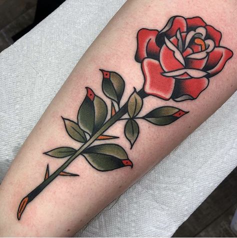 Rose Tattoo Traditional, Rose Stem Tattoo, Traditional Tattoo Arm, American Traditional Rose, Traditional Rose Tattoo, Tato Tradisional, Rose Tattoo On Arm, Name Tattoos On Wrist, Traditional Tattoo Inspiration