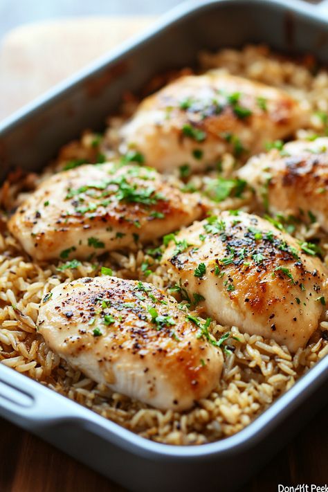 Discover the magic of No Peek Chicken, an oven-baked delight that's full of rich, savory flavors. Just set it in the oven and let it do its thing—no peeking needed until it’s time to serve. Perfect for a fuss-free dinner. #NoPeekChicken #EasyDinner #OvenBaked No Peak Chicken With White Rice, No Peak Chicken, Chicken With White Rice, No Peek Chicken And Rice, No Peek Chicken, No Peek, No Peeking, Cream Of Celery, Weekday Dinner