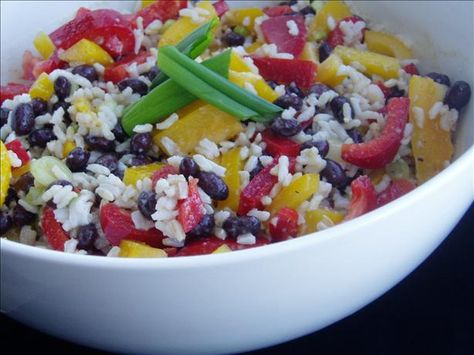 Caribbean Rice and Black Bean Salad - i made this salad last night (sans the peppers, of course!) and it was deeeeelish! i was a little leery of the dressing because i gave it a taste before putting it on the rice, beans and corn...but i'm glad i did...it tasted wonderful once it was all mixed together! Bean And Rice Salad, Black Bean And Rice, Caribbean Rice, Bean And Rice, Black Bean Salad Recipe, Rice Salad Recipes, Bean Salad Recipe, Tropical Food, Black Bean Salad