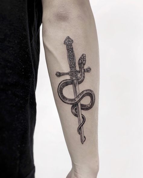 Tattoo of a detailed sword with a snake wrapped around it. Black and grey, detailed, fineline, microrealism tattoo. Snake And Dagger Tattoo, Arm Tats, Dagger Tattoo, Snake Tattoo, A Snake, Arm Tattoo, Doodle Art, I Tattoo, Tatting