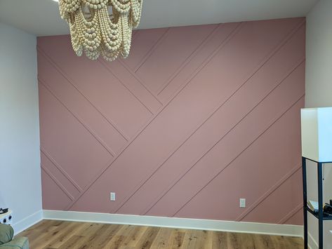 Rose Accent Wall Bedroom, Nursery With Textured Walls, Wood Accent Wall Bedroom Wood Boards & Planks, Mauve Feature Wall, Pink Wood Accent Wall Nursery, Rose Pink Accent Wall, Gray Room With Pink Accent Wall, Pink Focal Wall, Pink Shiplap Wall Bedroom