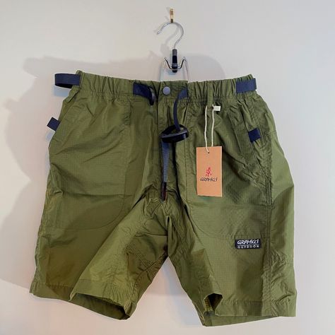 Nwt. Gramicci "Utility Trail" Shorts In Army Green Ripstop Fabric From 2022. Elastic Waist With Integrated Webbing Belt. Velcro Pockets. Size Is Labelled As Asia Small / Usa Extra-Small. Waist Measures ~28" Flat And ~32" When Pulled Taught. Under Armor Shorts, American Shorts, Fishing Shorts, Camo Men, Y2k Men, Webbing Belt, Riding Pants, Camo Shorts, Navy Blue Shorts