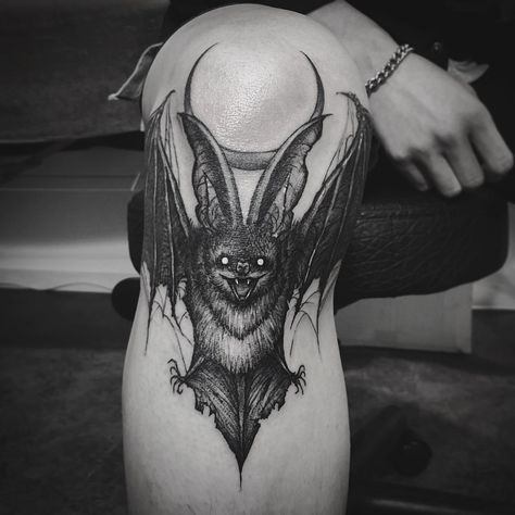 Bat And Moon Tattoo Ideas, Bat Tattoo On Leg, Heavy Black Work Tattoo, Bat Lower Back Tattoo, Bat Shin Tattoo, Bat Under Knee Tattoo, Goth Knee Tattoos, Gothic Nature Tattoo, Gothic Knee Tattoo