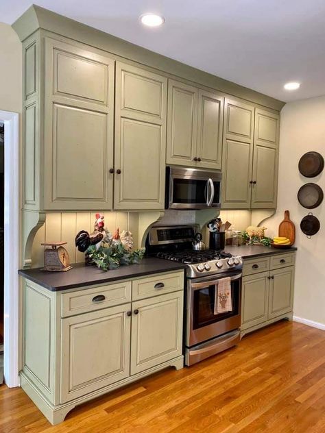 Thyme Green Paint, Brown Stone Countertops, Quaint Kitchen Ideas, Olive Green Kitchen Cabinets, Green Kitchen Cupboards, Green Country Kitchen, Kitchen Cupboard Colours, Glazed Kitchen Cabinets, Olive Green Kitchen