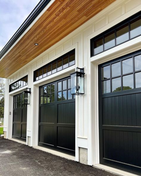 Black Double Garage Doors, Modern Farmhouse Garage Doors Black, Black Wood Garage Doors, Garage Doors Modern Farmhouse, Black Modern Garage Door, Black Garage Door With Windows, Black Garage Doors With Windows, Garage Doors On White House, White Oak Garage Door