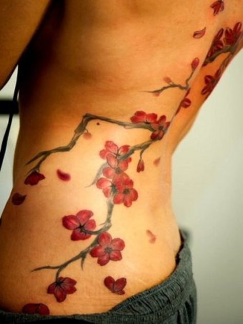 Tattoos are always very expressive. They tell a story about who you are and what you've been through. Why are cherry blossoms so common? Learn the Cherry Blossom Tattoo Meaning. Unique Sister Tattoos, Cherry Blossom Tree Tattoo, Blossom Tree Tattoo, Tattoo Tree, Minimal Tattoos, Ankle Tattoo Designs, Red Cherry Blossom, Tree Tattoo Designs