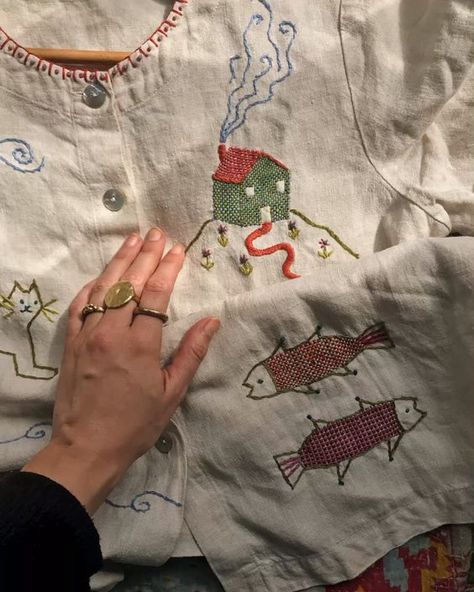 A one of a kind hand embroidered linen blouse by Madeleine kemsley Instagram @ madeleine_illustration   This work is the intellectual property of Madeleine kemsley Thread & Yarn, Embroidery On Clothes, Embroidered Linen, A Hill, Shirt Embroidery, House On A Hill, Embroidered Clothes, Linen Blouse, Happy Cat