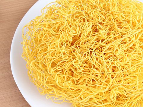 Sev is a noodle type crispy snack made from gram flour. It is particularly used in many Indian food and snack preparations as main ingredient or garnishing agent. It can be prepared at home very easily using sevai machine. Sev Recipe, Gram Flour, Indian Snacks, Indian Cooking, Indian Recipes, Cake Flour, Us Foods, Indian Food Recipes, Noodles