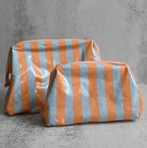 Something sunny for the weekend.. 🍑 Our bestselling machine washable striped wash bags are ALMOST sold out in all the colourways.. we’ve got a few of our fav sweet and fruity Peach & Sky Blue in both medium and large left! 🍑 These vintage-inspired wash bags are made in Denmark and inspired by mid century Italian luggage, with a contrasting lining and structured suitcase style silhouette (they stand up on their own so no more scrabbling) plus they are actually GENUINELY machine washable! Sham... Soft Accessories, Stylish Luggage, Zsa Zsa, Green Bubble, Holiday Essentials, Pink Sand, Wash Bag, Pink Stripes, Medium Bags