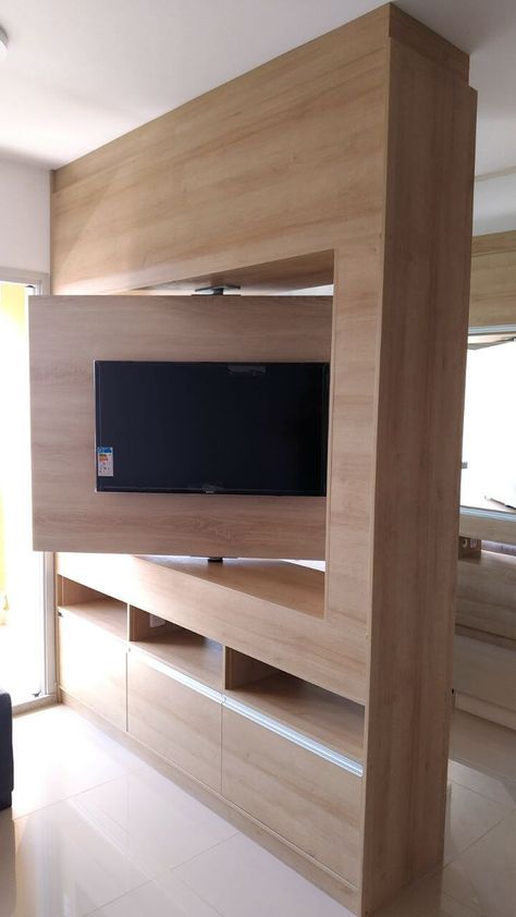 Elegant Rotating TV Stand Design IdeasYou’ll Love - Engineering Discoveries Living Room Separator, Room Separator Ideas, Tv Stand Room Divider, Rotating Tv, Living Room Separator Ideas, Creative Room Dividers, Modern Partition, Modern Partition Walls, Room Separator