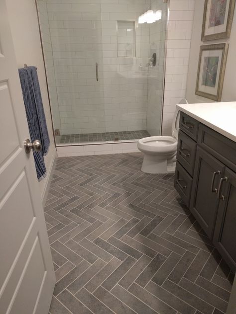 Bathroom tile and vanity top, needs wood stained vanity for warmth - Overland Model Basement Bathroom Dark Vanity Bathroom, Light Grey Flooring, Bathroom Remodel Plans, Grey Vinyl Flooring, Rental Bathroom, Farmhouse Vanity, Brown Bathroom, Bathroom Redesign, Basement Bathroom