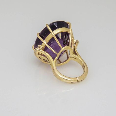 Large Oval Facetted Amethyst approximately 35c prong set with 2 - .25c each diamonds on either side mounted in a 14k yellow gold mounting.  US size 4 - It can be made larger.    .5 depth is from top of stone to top of finger.  The ring measures 1" wide by 1.04" tall by .5" deep. Antique Amethyst Jewelry, Amethyst Jewelry Ring, Purple Engagement Rings, Antique Amethyst Ring, Amethyst Birthstone Ring, Large Stone Rings, Jewelry Knowledge, Diamond Bracelet Design, Silver Pooja Items