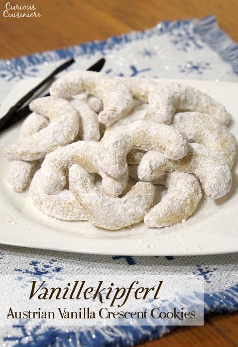 Crisp and buttery with a nutty, almond flavor, this recipe for delicate Vanillekipferl, or Austrian Vanilla Crescent Cookies, creates cookies that look pretty on a platter and are sure to be a hit at your holiday party. #Christmas #cookies #vanilla Almond Crescent Cookies, German Christmas Cookies, Crescent Cookies, Dreamy Desserts, Austrian Recipes, German Recipes, Almond Flavor, Almond Cookies, Christmas 2015