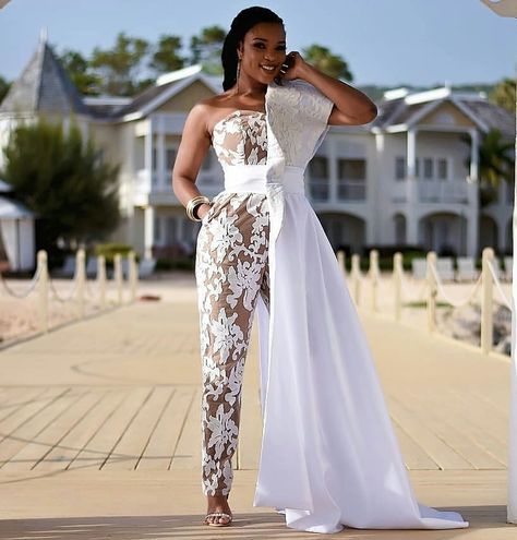 How beautiful is this bridal Jumpsuit? Would you rock it for your reception look or your bridal shower? please You can follow us here, Twitter & Pinterest #hustlersquare #wearmadeinnigeria #ebweddings #asoebifabrics #lagosweddings #ankarafashionstyle #asoebiguest #ibadanweddings #edowedding #asoebistyle #tradwedding #madeinafrica #ankarafashiongallery #fabricsinlagos #phmua #partyjollof #naijaweddings #asoebilagos #loveweddingsng #naijamarketplacee #owambestyle #asoebihouse #bbnaija #edobride  # Reception Jumpsuit, Prom Jumpsuit, White Lace Jumpsuit, Engagement Party Dresses, African Prom Dresses, African Wedding Dress, Bridal Jumpsuit, Wedding Jumpsuit, Gown Styles