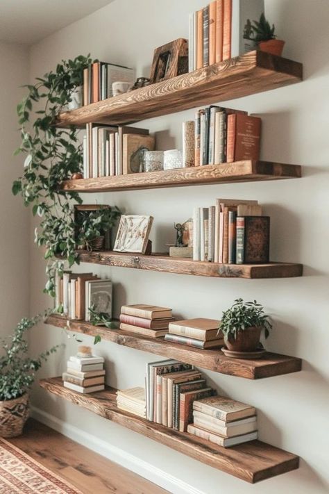 "DIY Floating Shelves: Maximize Space with Style! 🛠️✨" Transform your small space with these easy-to-make floating shelves! Perfect for adding storage and style without taking up floor space. 🏡🌿 #DIYFloatingShelves #SmallSpaceStorage #HomeDecorDIY #EcoFriendlyProjects #CreativeStorageSolutions Diy Counter Shelves, Living Room Shelves Floating, How To Make Your Own Floating Shelves, White And Wood Shelves, Book Storage In Small Bedroom, Floating Shelves Floor To Ceiling, Free Floating Bookshelves, Home Library Floating Shelves, Apartment Friendly Floating Shelves