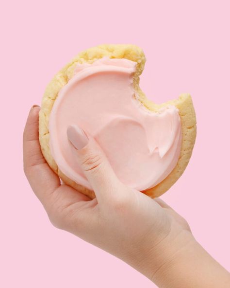 Hand holding a pink sugar Crumbl cookie Crumbl Pink Sugar Cookie, Crumbl Cookie Flavors, Cookie Copycat Recipes, Atlanta Suburbs, Crumbl Cookie Copycat, Fun Cookie Recipes, Crumbl Cookies, Cookie Flavors, Pink Sugar