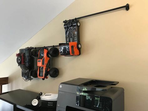 RC Car Wall Hanging Storage Idea Rc Truck Storage Ideas, Ikea Fintorp, Monster Truck Bedroom, Truck Bedroom, Garage Hacks, Boys Playroom, Truck Storage, Rc Cars And Trucks, Car Hangers