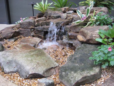 Pondless Waterfall | Small Pondless Waterfall using Mountain… | A Beautiful Yard | Flickr Backyard Pondless Waterfall, Small Garden Waterfalls, Pondless Water Features, Waterfall Garden, Pondless Waterfall, Taman Air, Garden Ponds, Outdoor Water Features, Fountains Backyard