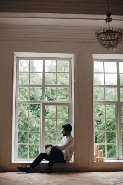 Man Sitting On Window Sill At Home Sitting On Window Sill, Sitting On Window, Window Photography, Window Ledge, Guy Best Friend, Reference Pics, Human Reference, Kiev Ukraine, Man Sitting