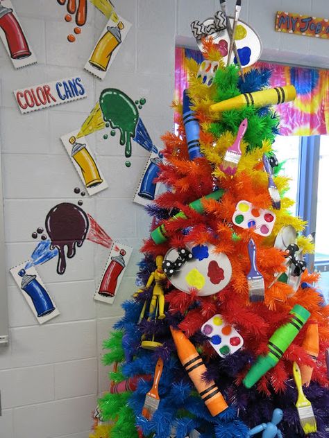 Cassie Stephens: Art Room Rainbow Tree (and a New Mural)! Crayons Christmas Tree, Art Room Christmas Tree, School Themed Christmas Tree, Crayon Christmas Tree, Crayola Christmas Tree, Art Themed Christmas Tree, Artist Christmas Tree, Classroom Christmas Tree Ideas, School Christmas Tree