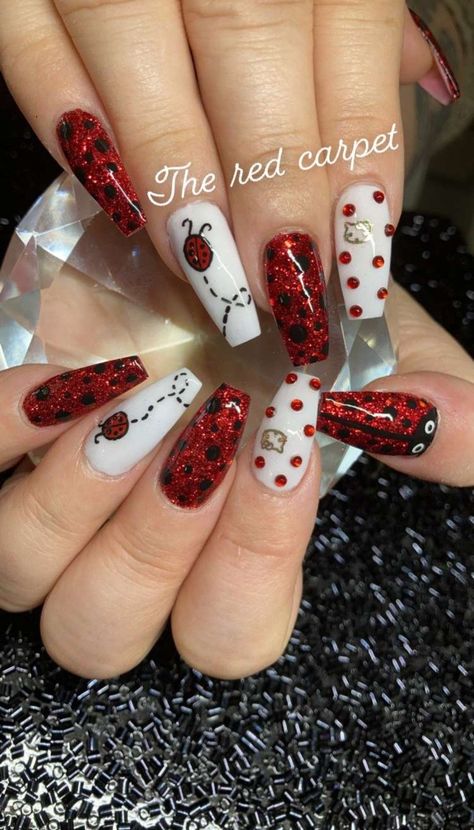 Acrylic nails red ladybug hello kitty spring white accents gems painted nails Ladybug Nail Art Design, Ladybug Nails Acrylic, Ladybug Acrylic Nails, Bug Nail Designs, Ladybug Nails Designs, Fairycore Nails, Bug Nails, Ladybug Nail Art, Acrylic Nails Red