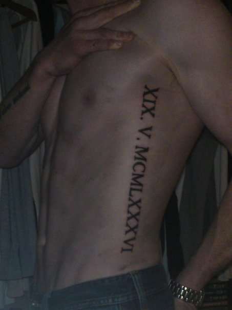 Roman Numeral Rib Tattoo Men, Roman Numeral Side Tattoo, Roman Numeral Rib Tattoo, Side Ribs Tattoo, Side Rib Tattoo Men, Ribcage Tattoo Men, Ribs Tattoo Men, Numerical Tattoos, Mens Rib Tattoo