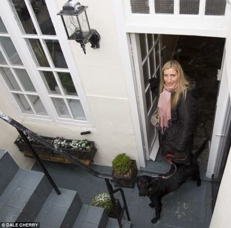 Down home: Kate Maitland at the entrance to her flat on exclusive Cheyne Walk in Chelsea, London, which she is selling for £700,000 Basement Entry, Small Basement Design, Basement Flat, Basement Guest Rooms, Basement Doors, Basement Entrance, Apartment Entrance, Rustic Basement, Entry Stairs