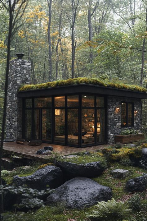 Glass cabin with a moss-covered roof in the woods. Uncover how sleek design, cozy woodwork, and a dash of minimalist charm are transforming cabins from rustic hideaways to luxurious retreats. Moss Roof House, Moss Roof, Moss House, Modern Cabins, Forest Houses, Chic Cabin, Cabin Modern, Glass Cabin, Forest Backdrops